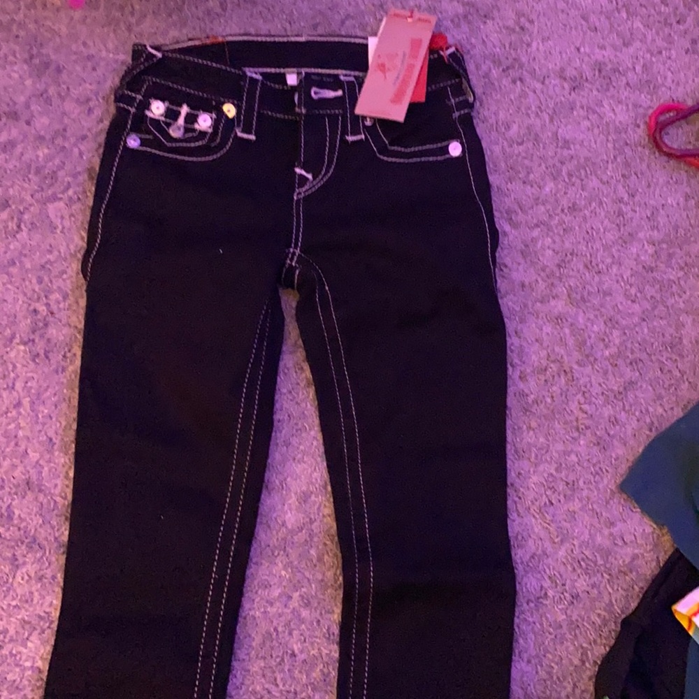 true religion black with white stitching pants